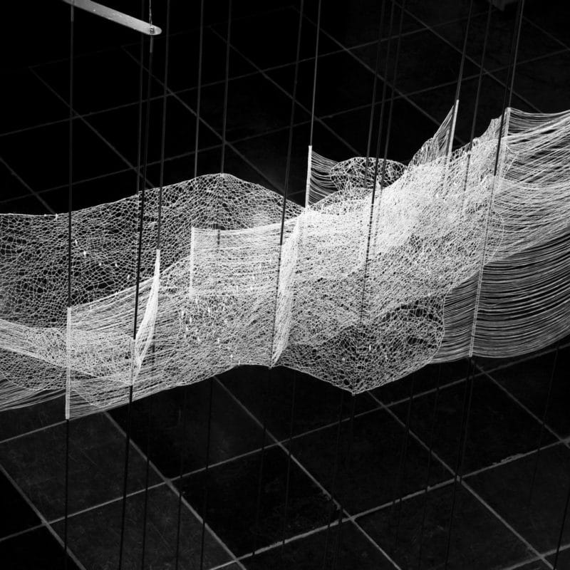 “Strategima”, 2011, 210x80x210 cm, Tencel yarn,Stainless steel,Transparent hose, copyright Annie Verhoeven