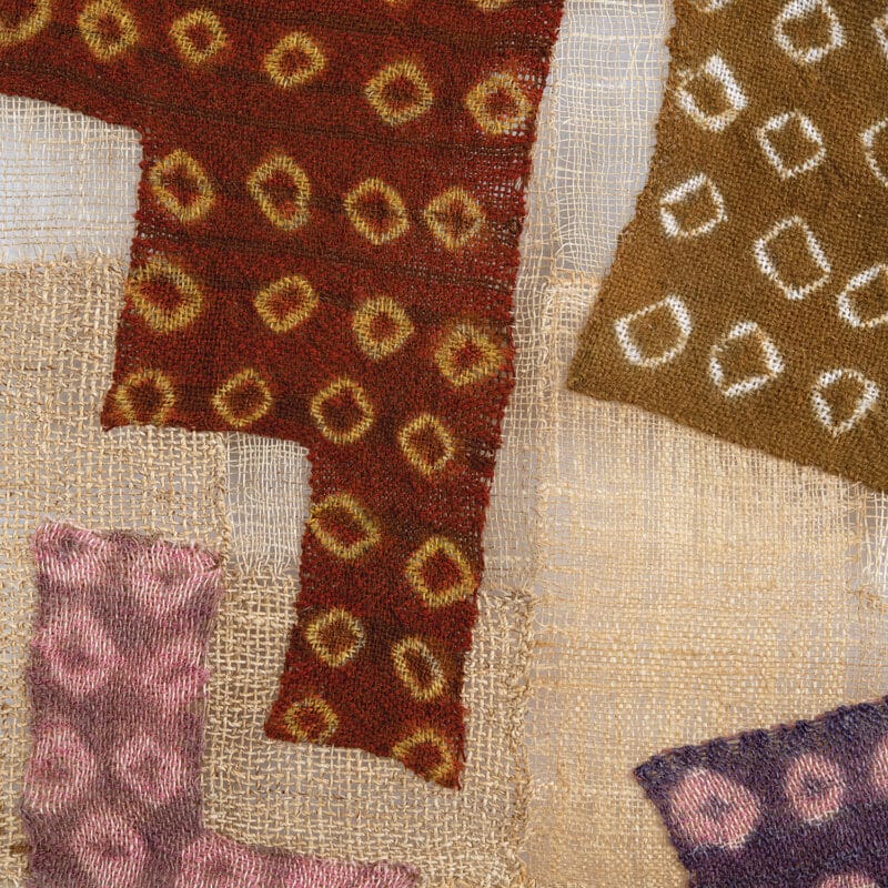My Letterman Yantra, 2012 (front), natural brown cotton, handspun silk, waxed linen – plain weave, brocade - dye immersion with off-set printing method (wicking); large figures, letters and numbers in raised embroidery, with smaller figures also embroidered in part or completely; 28.5”x32.5”, photo cr. Tom Grotta, copyright James Bassler (US)