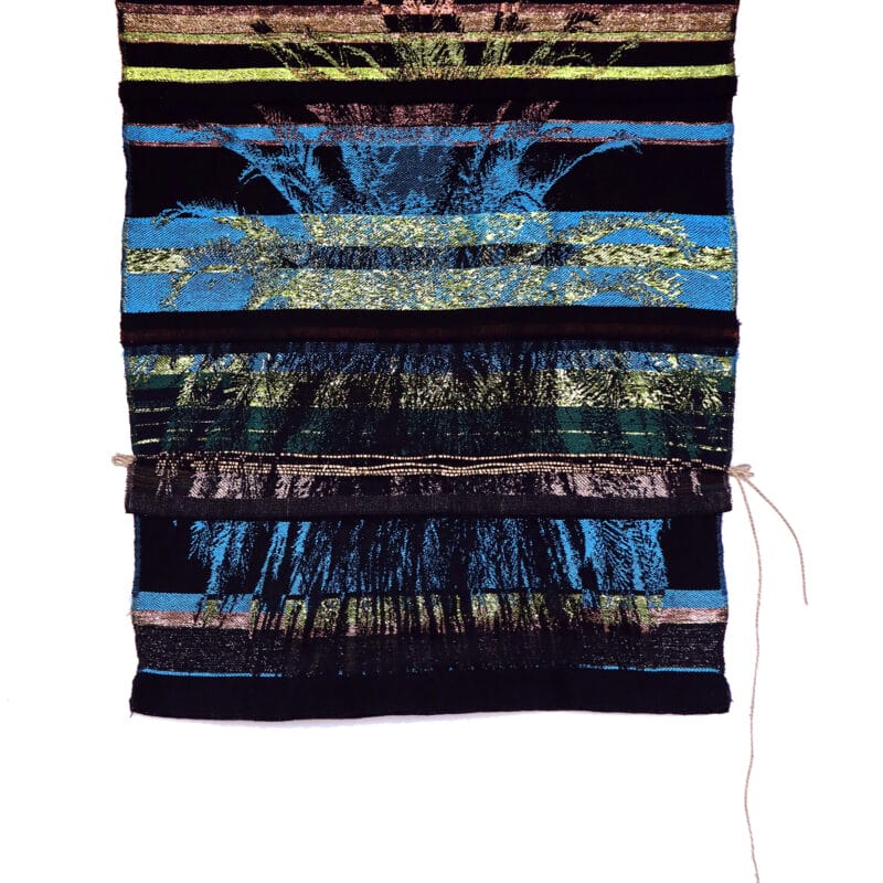 “Oakland Native”, 2019, digital-hand loomed cotton, rayon, metallic threads, and sea grass cordage. 38” × 29” × 1”. Image courtesy of the artist, copyright Kira Dominguez Hultgren