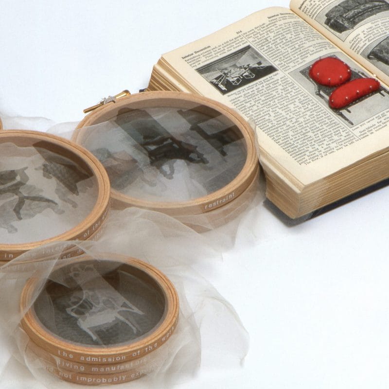“Bodies of Knowledge Volume 5; Arbiters of Taste-detail”, 2002, 1934 Encyclopaedia, printed silk crepeline, pins, embroidery hoops, 5cm x 84cm x 34 cm, ph. cr. Michael Wicks, in the collection of Victoria and Albert Museum, copyright Caroline Bartlett