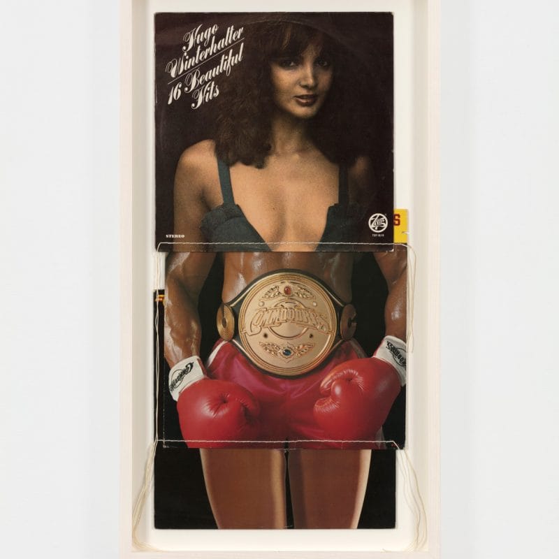 Christian Marclay, Hits (from the series ‘Body Mix’), 1991 three record covers and cotton, thread image: 26 1/2 x 13 in. (67.3 x 33 cm), frame: 29 3/4 x 16 1/4 x 2 in. (75.6 x 41.3 x 5.1 cm). Courtesy Paula Cooper Gallery