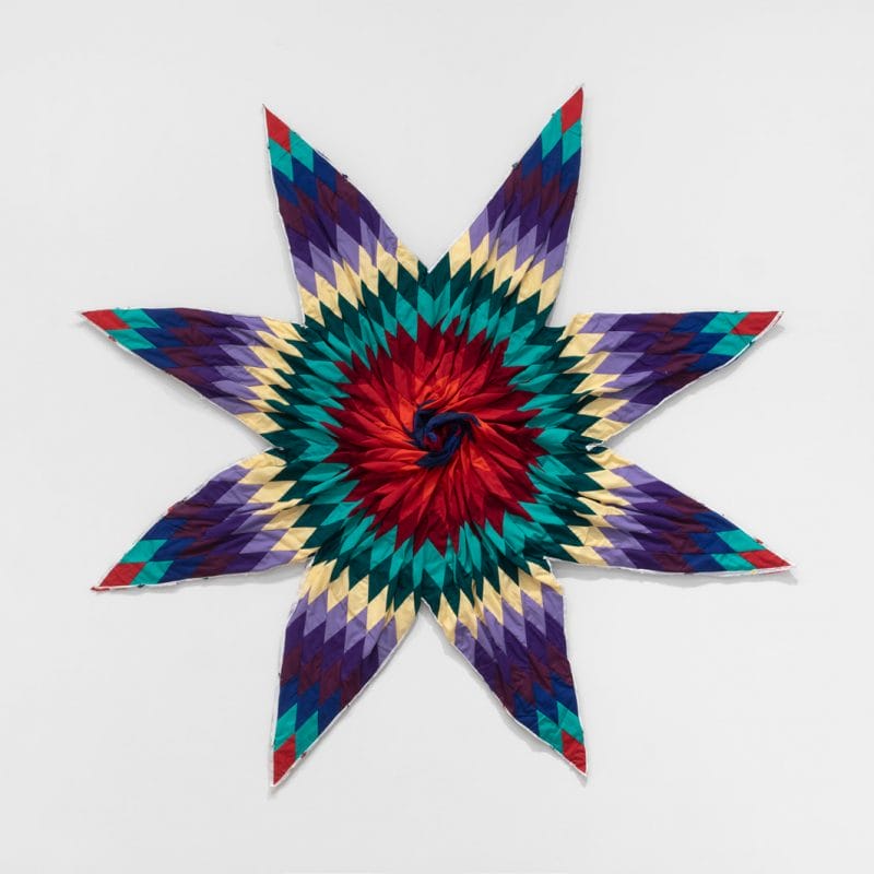 Sanford Biggers, Burst, 2021, mixed textiles and acrylic, 64 x 64 x 3 in. (162.6 x 162.6 x 7.6 cm), signed verso