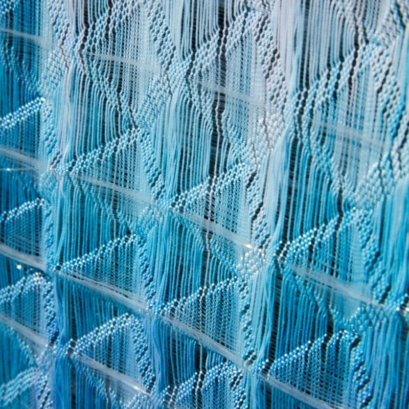 MANGATA-detail, 2021, 3D Textile, 15 W x 24 H x .25 D inch. Hand dyed cotton warp and gradient monofilament thread weft Made on a 24 Harness AVL Dobby Loom, copyright Anya Molyviatis