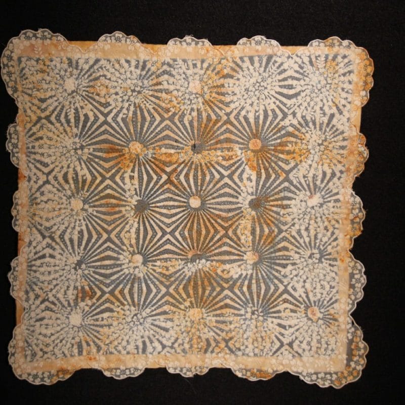 Victorian Rustbelt Escher. 2013. 12 ¼ w x 12 3/8” h. Vintage nylon flocked handkerchief; batik cotton. Rustdyed, handstitched with silk sewing thread. Micron pen drawing.
Photo Credit: Polly Whitehorn, copyright Camilla Brent Pearce