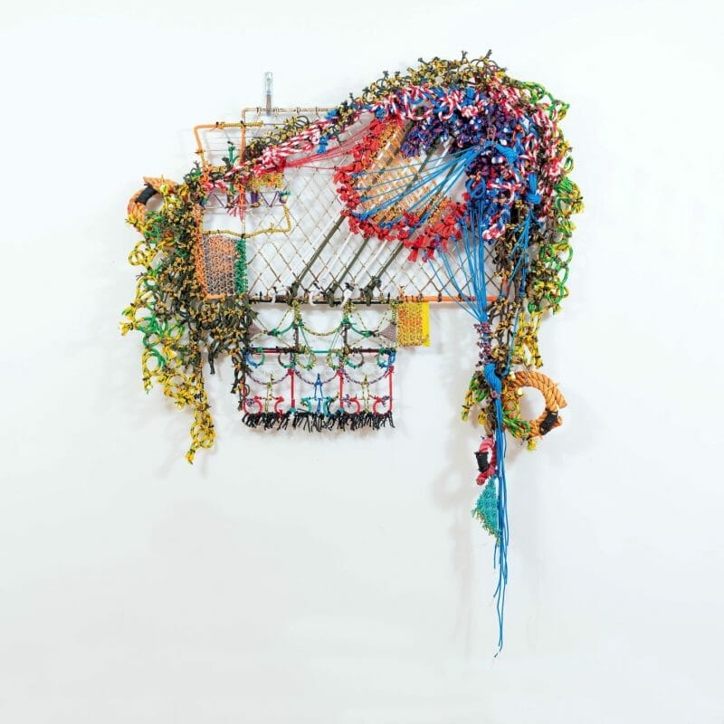 Architectural Hyperbole 01, assorted rope, zip ties, and other mixed media on metal and plastic armature, 40" x 65" x 6”, 2021. Photo credit: John Dooley, copyright Liz Miller