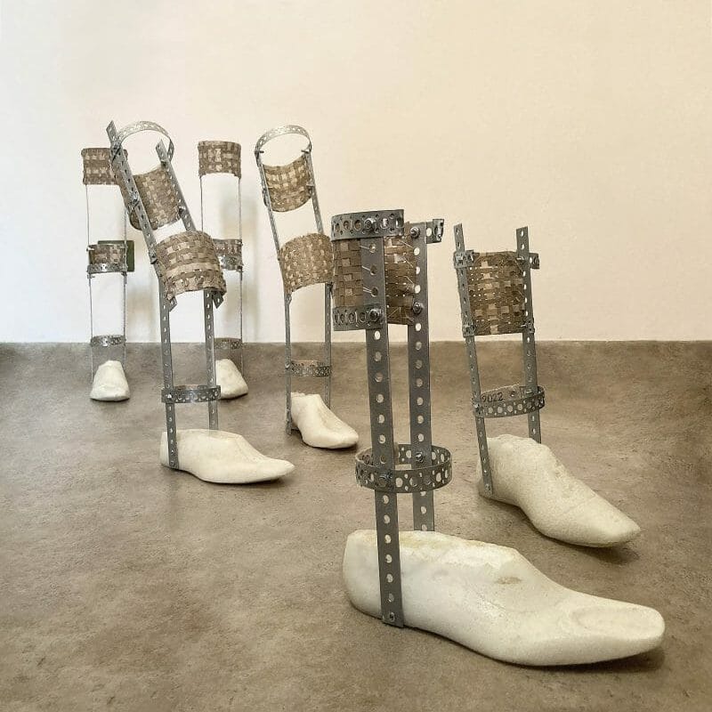 DAVIDE VIGGIANO, Transhumance, cm.100x60x180; assemblaggio di scarpe in biomateriale termoindurito, metallo, cotone, vinile, cashmere e bioplastica; anno 2022